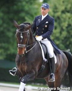 Steffen Peters and Ravel warm up for the Aachen Grand Prix :: Photo © Barbara Schnell