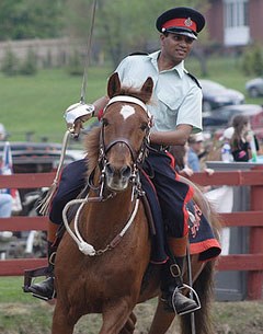 Akaash Maharaj attending the 2006 Uxbridge Horsemen's Association fair on behalf of the Governor General's Horse Guards, and demonstrating equestrian skill-at-arms.