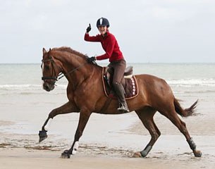 Helene Legallais and Unique having fun on the beach