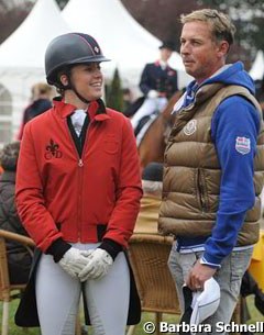 Charlotte Dujardin talks to her trainer and boss Carl Hester