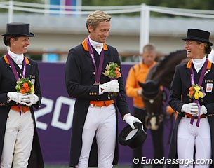 The bronze medal winning Dutch team sharing a laugh on the podium: Anky, Edward, Adelinde