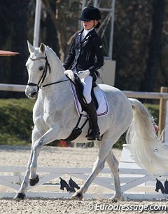 French pony rider Clarissa Stickland Rufin on her second FEI pony, schoolmaster Just You 'n Me, who is registered as "Memory" in France. 