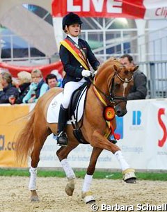 Francesca Heil and Dimension win the 5-year old division at the 2013 Bundeschampionate :: Photo © Barbara Schnell