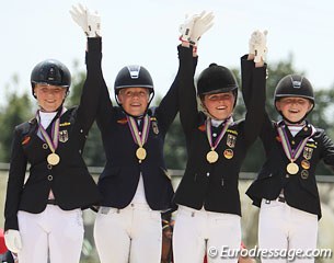 The German gold medal team riders rejoice on the podium: Sophie Kampmann, Hannah Cichos, Nadine Krause, and Semmieke Rothenberger :: Photo © Astrid Appels