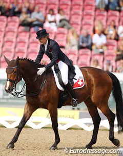 Marcela Krinke-Susmelj pats Molberg and leaves the arena in walk at the 2013 European Dressage Championships :: Photo © Astrid Appels