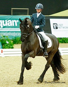 Emily O'Neill and her Frieisian Sir Lancelot won the Third level freestyle championship at the 2013 U.S Dressage Finals :: Photo © Sue Stickle