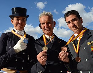 The podium at the 2013 Spanish Developing Prix St Georges Horse Championships: Beatriz Ferrer-Salat (silver), Juan Antonio Jimenez (gold), Jose Antonio Diaz Porras (bronze) :: Photo © Top Iberian