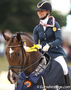 Eva Moller and Sa Coeur win the 6-year old division at the 2013 World Young Horse Championships :: Photo © Astrid Appels
