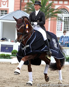 Uta Gräf and Damon Jerome win the national Prix St Georges at the 2013 CDI Wiesbaden :: Photo © Silke Rottermann