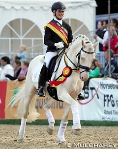 Wibke Hartmann-Stommel and Golden West win the 2014 Bundeschampionate :: Photo © Melissa Mulchahey