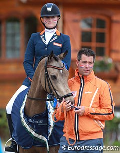 Lisanne Zoutendijk on Champ of Class, home trainer Jeroen Okkema cuddling the pony