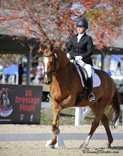 Amy Gimbel and Eye Candy (by Weltmeyer x UB40) win the Training Level Adult Amateur Championship at the 2014 U.S. Dressage Finals :: Photo © Sue Stickle