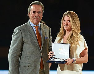 Morgan Barbançon Mestre receives the trophy as best performing and youngest Spanish rider at the 2014 World Equestrian Games during the 2014 Madrid Horse Week. 
