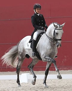 Sarah Warne and her Lusitano stallion Batialo in competition in Portugal