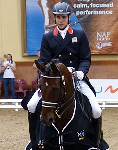 Charlie Hutton and Douglas IV in the lap of honour at the 2014 CDI Saumur :: Photo © Judy Peploe