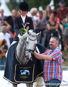Stephanie Dearing on Del Magico, flanked by the stallion's breeder Stefan Hermann