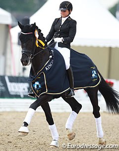 Dorothee Schneider and Sezuan win the 5-year old preliminary test at the 2014 World Young Horse Championships :: Photo © Astrid Appels