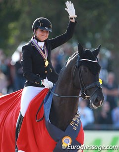 Dorothee Schneider and Sezuan win the 5-year old finals at the 2014 World Young Horse Championships in Verden :: Photo © Astrid Appels