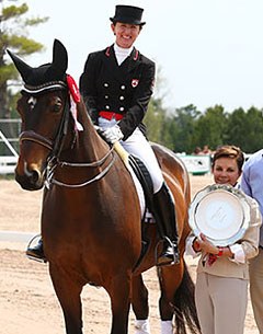 Belinda Trussell on Anton receiving the trophy from Mexican judge Maribel Alonso at the 2014 CDI Palgrave :: Photo © Michael Werner