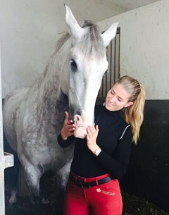 Morgan Barbançon cuddling her new ride Dragao in Portugal