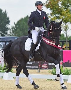 Michael Eilberg and Half Moon Dynasty at the 2015 British Dressage Championships :: Photo © Kevin Sparrow