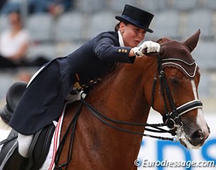 Timna Zach pulls Simply Red's ear at the end of her test