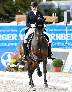 Dorothee Schneider on Sissy Max-Theurer's Chocolat (by Rosandro x Davignon) at the 2016 CDI Donaueschingen :: Photo © Karl Heinz Frieler