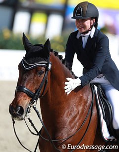 Joanne Vaughan pats her 17-year old Danish warmblood Elmegardens Marquis (by Michellino x Lucky Light)