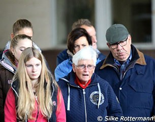 Dr. Juliette Mallison and Friedhelm Petry watching Stefan Stammer work with a horse.