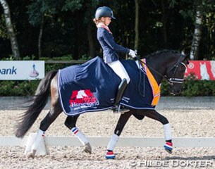 Robin Heiden and Oosterbroek Fenix win the 4-year old division at the 2016 Dutch Young Pony Championships :: Photo © Hilde Dokter