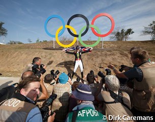 Photo frenzy to shoot Charlotte Dujardin with gold medal and flag in front of the Olympic rings :: Photo © Dirk Caremans