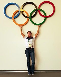 Dominican Republic's Yvonne Losos de Muniz with the Olympic rings in Rio