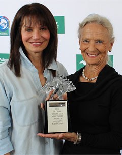 Carol Cohen presents Janne Rumbough with the Global Dressage Visionary Award during Week 8 of the 2016 Adequan Global Dressage Festival