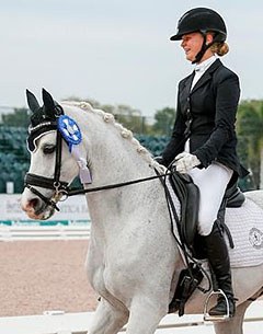 Hannah Irons and Bodhjan win the FEI Pony level Division at the 2016 Florida International Youth Dressage Championships :: Photo © Sue Stickle