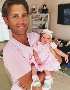 Caroline Roffman's fiancé Ben Meredith with the couple's first baby, Mae Victoria Meredith