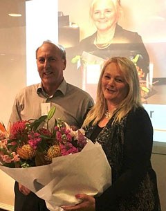 Karen Trotter receiving her Honorary Life Membership badge and flowers from ESNZ Vice President, Nick Pyke at the 2016 ESNZ General Assembly.