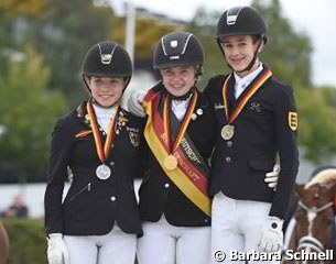 The pony podium at the 2017 German Youth Riders Championships in Aachen with Jana Lang, Anna Middelberg, and Moritz Treffinger :: Photo © Barbara Schnell