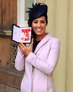 Charlotte Dujardin with her MBE medal at Buckingham Palace