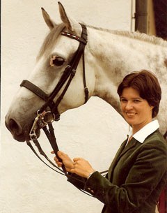 Sissy Max-Theurer, in her 20s, holding her Olympic Gold medal winning horse Mon Cherie
