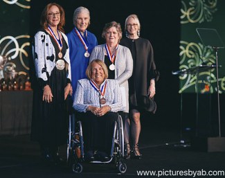 Hope Hand (Front Center) receiving her Pegasus Medal of Honor at the U.S. Equestrian Federation Annual Meeting in West Palm Beach, Florida, January 10, 2020 :: Photo © Adam Brennan