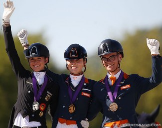 Lia Welschof, Daphne van Peperstraten, Marten Luiten on the Kur Podium at the 2020 European Young Riders Championships :: Photo © Astrid Appels