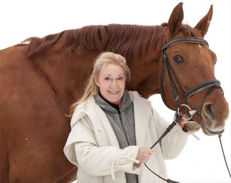 Christine Stuckelberger in December 2017, holding the 20-year old licensed Hanoverian stallion Wirbelwind (by Wolkenstein x Bolero) :: Photo © private