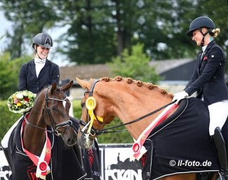 Bianca Nowag's Escorial Q and Friederike Kampmeyer's Beryll share the winner's circle at the 2021 Westfalian Young Horse Championships :: Photo © LL-foto