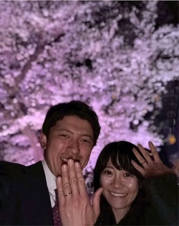 Shingo Hayashi and Sayo got engaged. Posing in front of a Japanese cherry tree in full bloom