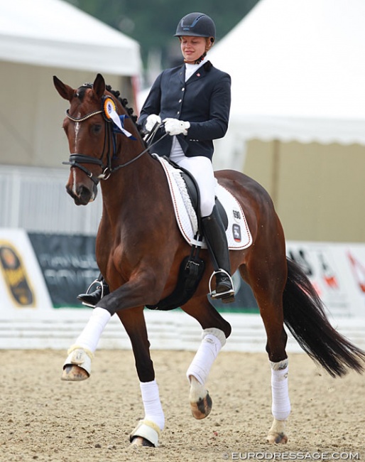 Ann-Christin Wienkamp and Samoura M win silver at the 2014 World Championships for Young Dressage Horses :: Photo © Astrid Appels