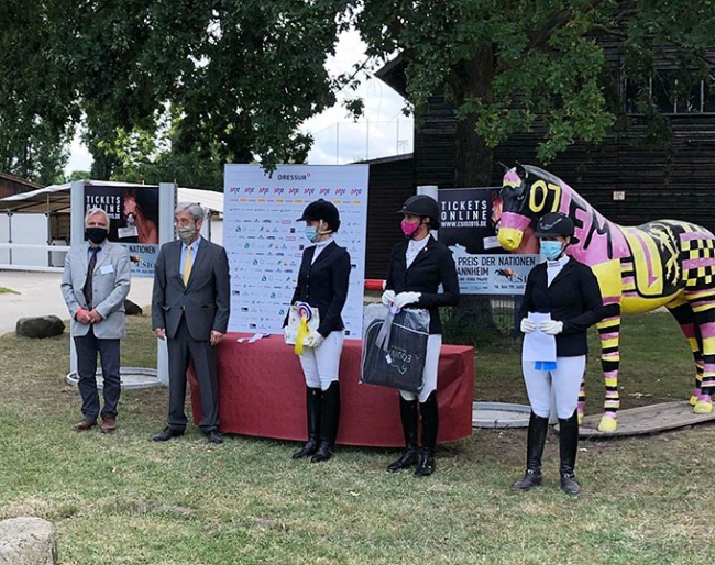 The prize giving for the M-level dressage horse test with Marie Christin Kogel as winner at the 2020 CDN Mannheim