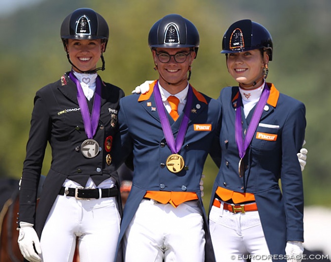 Lia Welschof, Marten Luiten and Daphne van Peperstraten on the individual podium at the 2020 European Young Riders Championships :: Photo © Astrid Appels