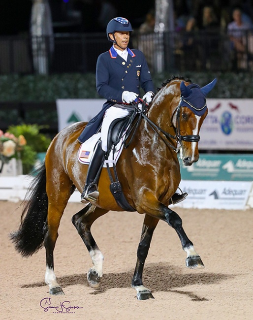 Steffen Peters and Suppenkasper competing under floodlights in the 5* Freestyle at the 2021 CDI Wellington :: Photo © Astrid Appels