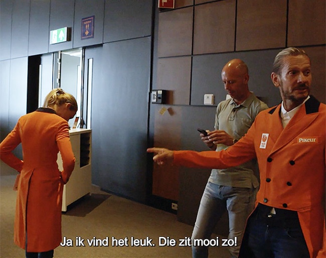 Dinja van Liere, Hans Peter Minderhoud and Edward Gal trying on the new orange tails for the 2021 Olympics :: screen shot