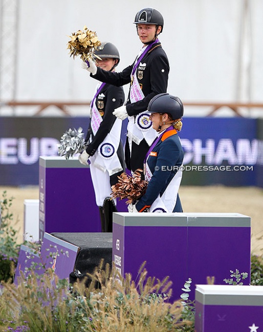 Semmieke Rothenberger, Raphael Netz and Jessica Poelman on the podium for the short grand prix medals at the 2021 European U25 Championships :: Photo © Astrid Appels